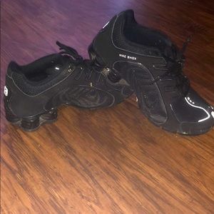 Black Nike Shox tennis shoes
